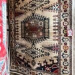 Bargain Traditional rug with an aztec style design.