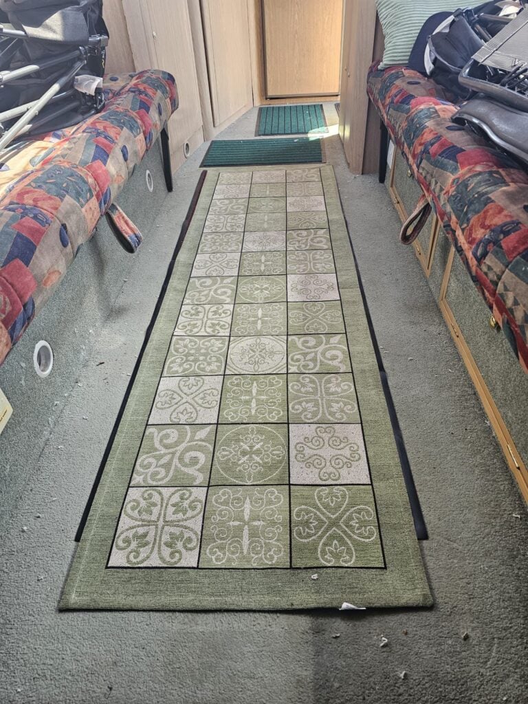 Old and worn main area carpet