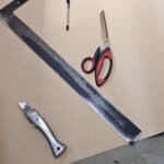tools laid out for replacing motorhome carpets