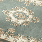 Image showing one of our wool rugs with an elegant floral pattern.